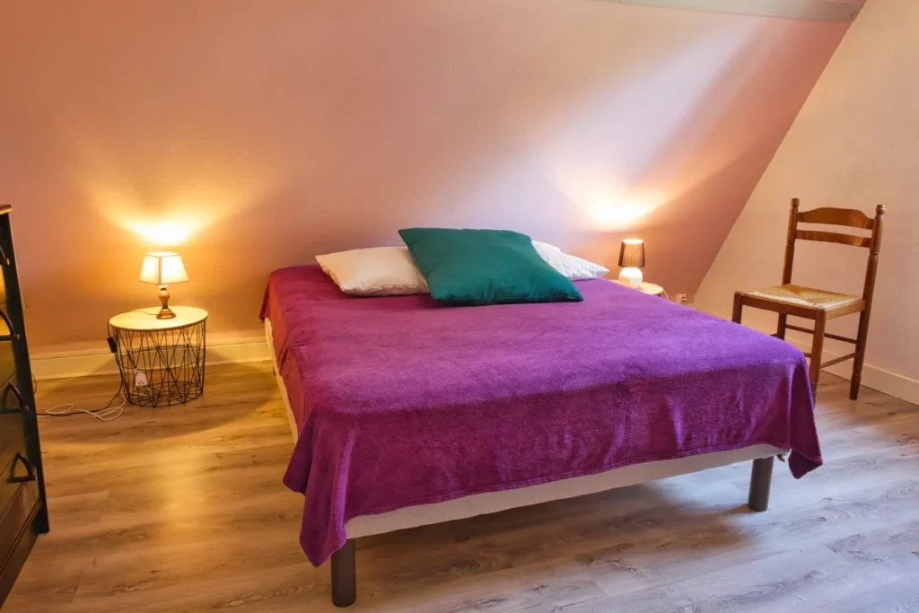 Chambre avec lit double à Villa Lupantia
